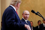 Президент США Дональд Трамп и президент России Владимир Путин во время пресс-конференции по итогам встречи в Хельсинки, 16 июля 2018 года