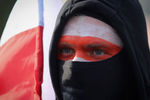 Участник марша «За свободу политзаключенных» в Минске, 4 октября 2020 года