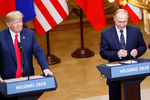 Президент США Дональд Трамп и президент России Владимир Путин во время пресс-конференции по итогам встречи в Хельсинки, 16 июля 2018 года