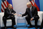 Владимир Путин и Дональд Трамп во время встречи на саммите G20 в Гамбурге