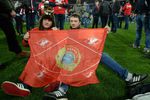 Болельщики на игровом поле после окончания матча 29-го тура чемпионата России по футболу среди клубов Премьер-лиги между командами ФК «Спартак» (Москва) и ФК «Терек» (Грозный).