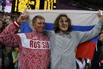 Ухов с тренером празднуют успех