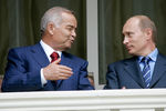 2006 год. Президент Узбекистана Ислам Каримов и президент России Владимир Путин во время встречи в резиденции «Бочаров Ручей»