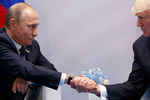 Владимир Путин и Дональд Трамп во время встречи на саммите G20 в Гамбурге