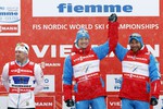 Россияне после выигрыша золота на подиуме