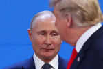 Президент России Владимир Путин и президент США Дональд Трамп на саммите G20, 30 ноября 2018 года