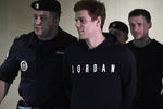 Футболисты Александр Кокорин и Павел Мамаев перед началом заседания Пресненского районного суда Москвы, 3 апреля 2019 года