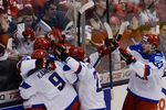 Игроки сборной России отмечают заброшенную шайбу