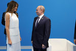 Первая леди США Меланья Трамп и президент России Владимир Путин, 7 июля 2017 года