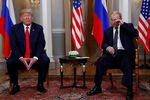 Президент США Дональд Трамп и президент России Владимир Путин во время встречи в Хельсинки, 16 июля 2018 года