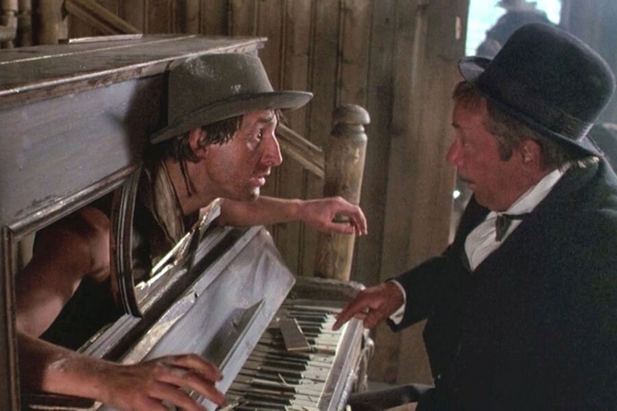 <b>&laquo;Человек с&nbsp;бульвара Капуцинов&raquo; (1987)</b>
<br><br>
Советский комедийный вестерн режиссера Аллы Суриковой об идеалисте мистере Фесте, который верит, что волшебный мир кино сделает людей лучше. В&nbsp;картине Олег Анофриев исполнил эпизодическую роль тапера-пианиста, аккомпанирующего в&nbsp;салуне во время первых киносеансов. Позже актер признавался, что эта работа для&nbsp;него была скорее &laquo;чистым заработком&raquo;
&laquo;Режиссер Алла Сурикова, хоть и называла меня своим талисманом, ничего лучше мне не нашла в&nbsp;этом фильме. Поэтому я и завязал с&nbsp;этой профессией. Мне очень мало давали ролей, а я любил быть первым. Вообще я реалист. Знаю, что у&nbsp;меня что-то получается в&nbsp;поэзии и музыке, а в&nbsp;кино и театре я так и не сыграл ничего хорошего&raquo;, &mdash; <a href=" https://www.kp.ru/daily/26407.3/3281467/" target="_blank"><b>говорил</b></a> он.