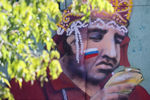 Граффити в Москве с изображением болельщиков на матче Россия — Испания, 3 июля 2018 года