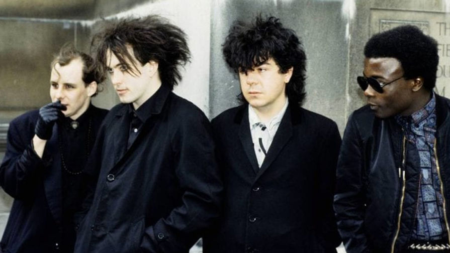 Группа The Cure и барабанщик Энди Андерсон (на фото справа)