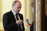 Владимир Путин и Ангела Меркель перед началом совместной пресс-конференции в Кремле, 2015 год