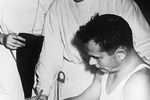 Павел Попович делает запись в дневнике после очередной тренировки, 1962 год