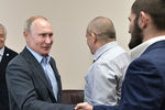 Президент России Владимир Путин и чемпион абсолютного бойцовского чемпионата (UFC) в&nbsp;легком весе Хабиб Нурмагомедов во время встречи, 2019&nbsp;год