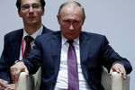 Президент России Владимир Путин во время посещения соревнований Международного турнира по дзюдо имени Дзигоро Кано во Владивостоке, 7 сентября 2017 года