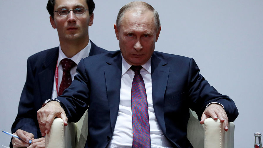 Президент России Владимир Путин во время посещения соревнований Международного турнира по дзюдо имени Дзигоро Кано во Владивостоке, 7 сентября 2017 года