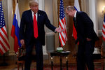Президент США Дональд Трамп и президент России Владимир Путин во время встречи в Хельсинки, 16 июля 2018 года