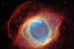 Туманность Улитка, сфотографированная телескопом Hubble и 4-метровым телескопом в Чили. 2004 год