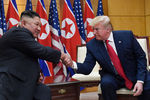 Во время встречи президента США Дональда Трампа и лидера КНДР Ким Чен Ына, 30 июня 2019 года