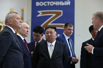 Президент РФ Владимир Путин и лидер КНДР Ким Чен Ын на космодроме Восточный. Слева: генеральный директор государственной корпорации по космической деятельности «Роскосмос» Юрий Борисов, 13 сентября 2023 года
