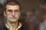 <b>Евгений Коваленко, 48 лет. </b> Признан виновным в причинении вреда, не опасного для здоровья (ч. 1 ст. 318 УК). Приговорен к 3,5 годам колонии. Вину не признал.