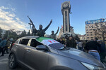 Боевики-повстанцы в центре города Хомс, Сирия, 8 декабря 2024 года