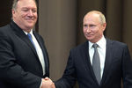 Президент России Владимир Путин и госсекретарь США Майк Помпео во время встречи в Сочи, 14 мая 2019 года