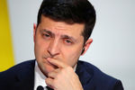 Президент Украины Владимир Зеленский во время пресс-конференции по итогам саммита «нормандского формата» в Елисейском дворце, 10 декабря 2019 года