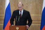 Президент РФ Владимир Путин во время пресс-конференции по итогам саммита форума «Азия — Европа»
