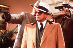 <b>«Неприкасаемые» (1987)</b>
<br><br>
В основе этой криминальной драмы лежат реальные событие времен «сухого закона» в США: картина рассказывает историю противостояния специального агента министерства финансов Элиота Несса и главы чикагской мафии Аль Капоне. «Неприкасаемыми» называлась группа агентов, которую собрал Несс, чтобы посадить неуловимого гангстера.
