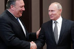 Президент России Владимир Путин и госсекретарь США Майк Помпео во время встречи в Сочи, 14 мая 2019 года